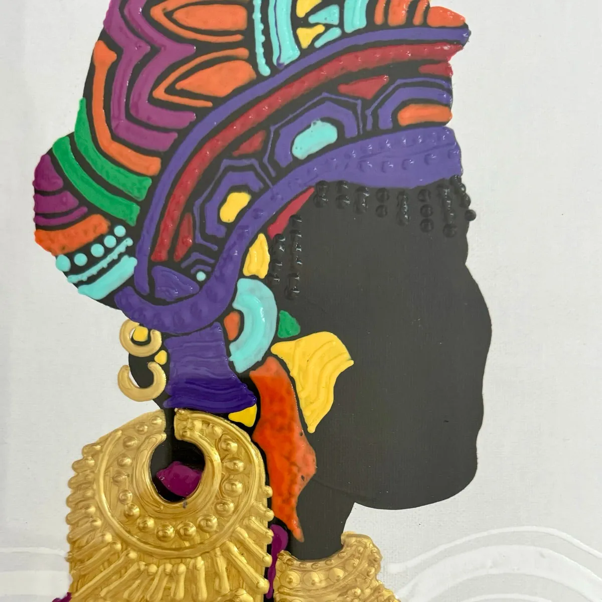 "Silhouette of a Woman with Head Scarf and Jewelry"